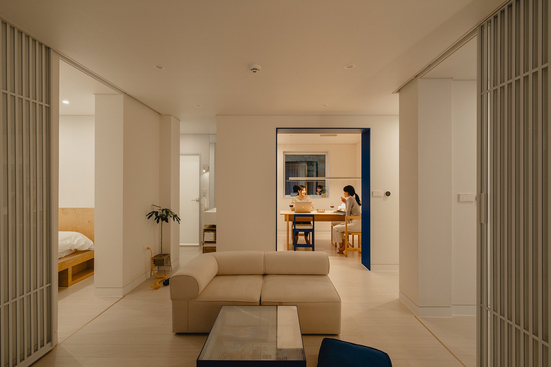 ZANZAN interior with a blue door frame and dining table